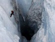 James Balog descends into in a moulin